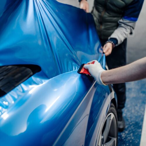 Car,Wrapping,Specialists,Putting,Vinyl,Foil,Or,Film,On,Car.